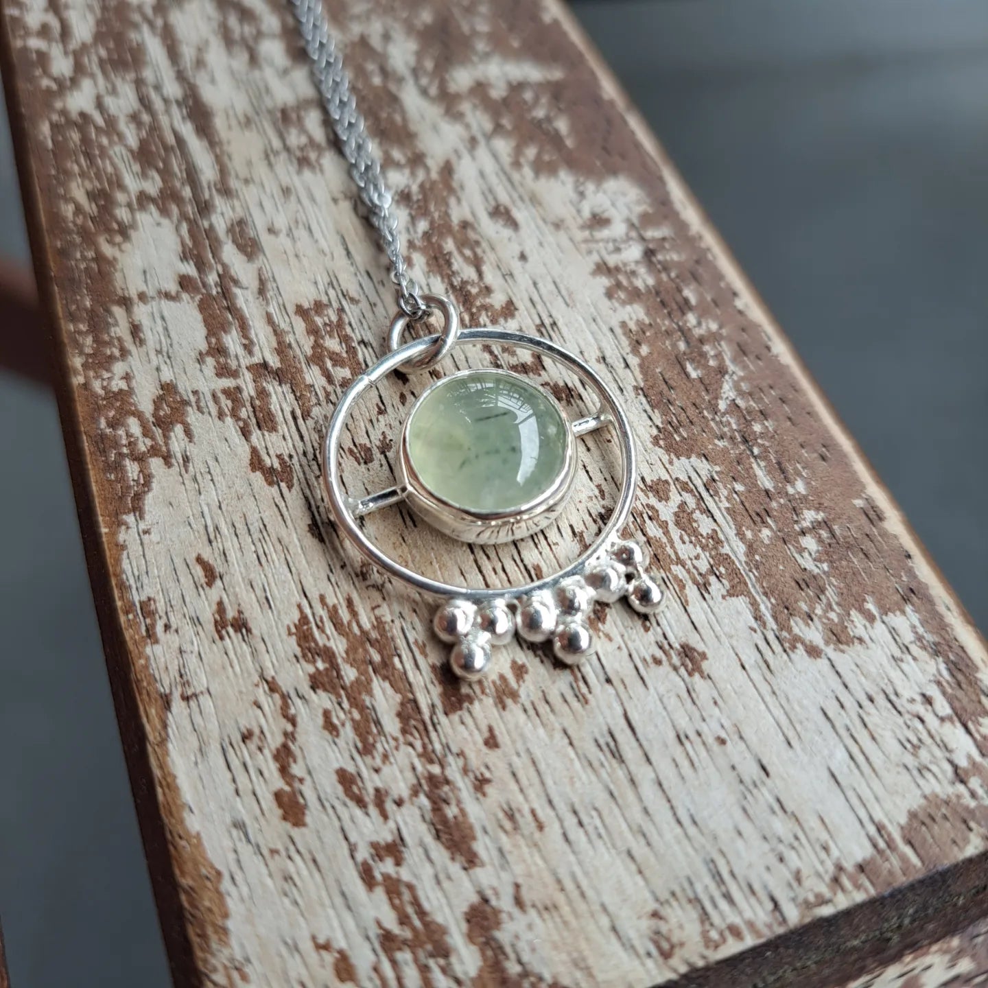 Prehnite and silver pendant