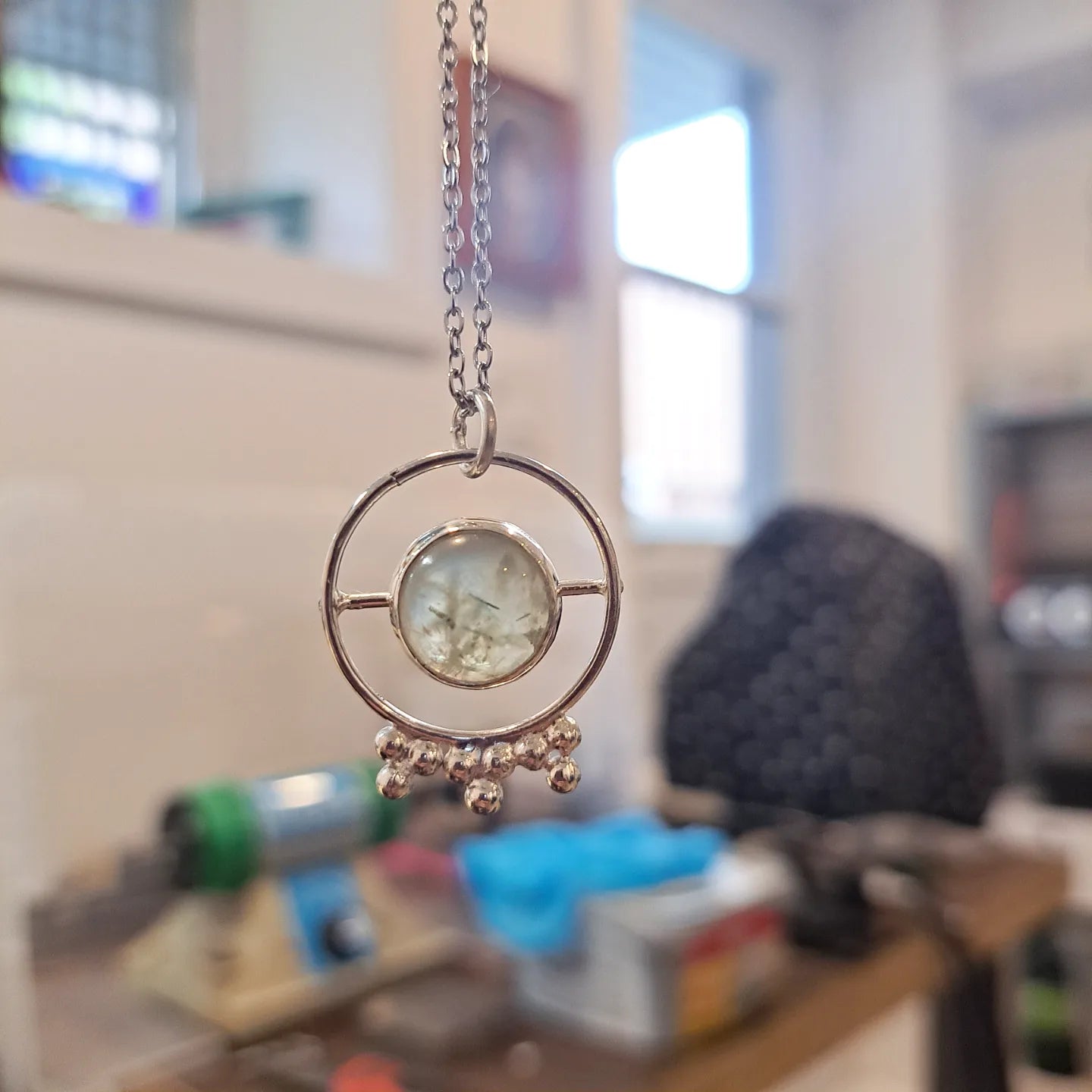Prehnite and silver pendant