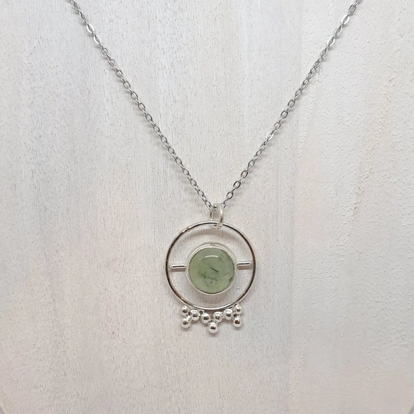 Prehnite and silver pendant