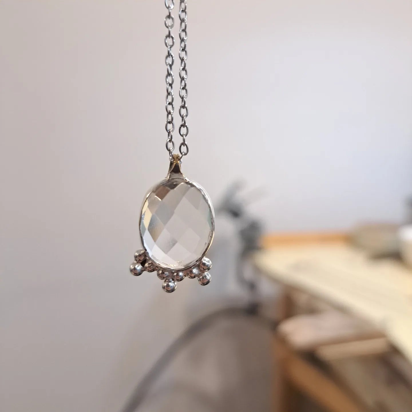 Clear quartz and silver pendant