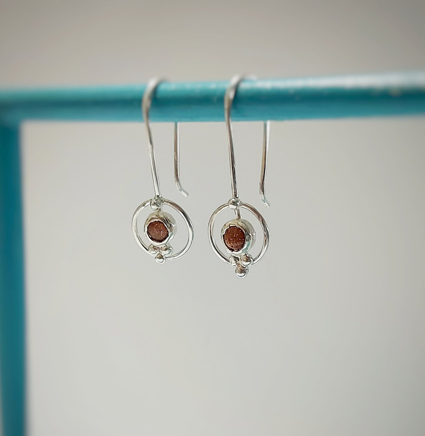 Circle dangle earrings