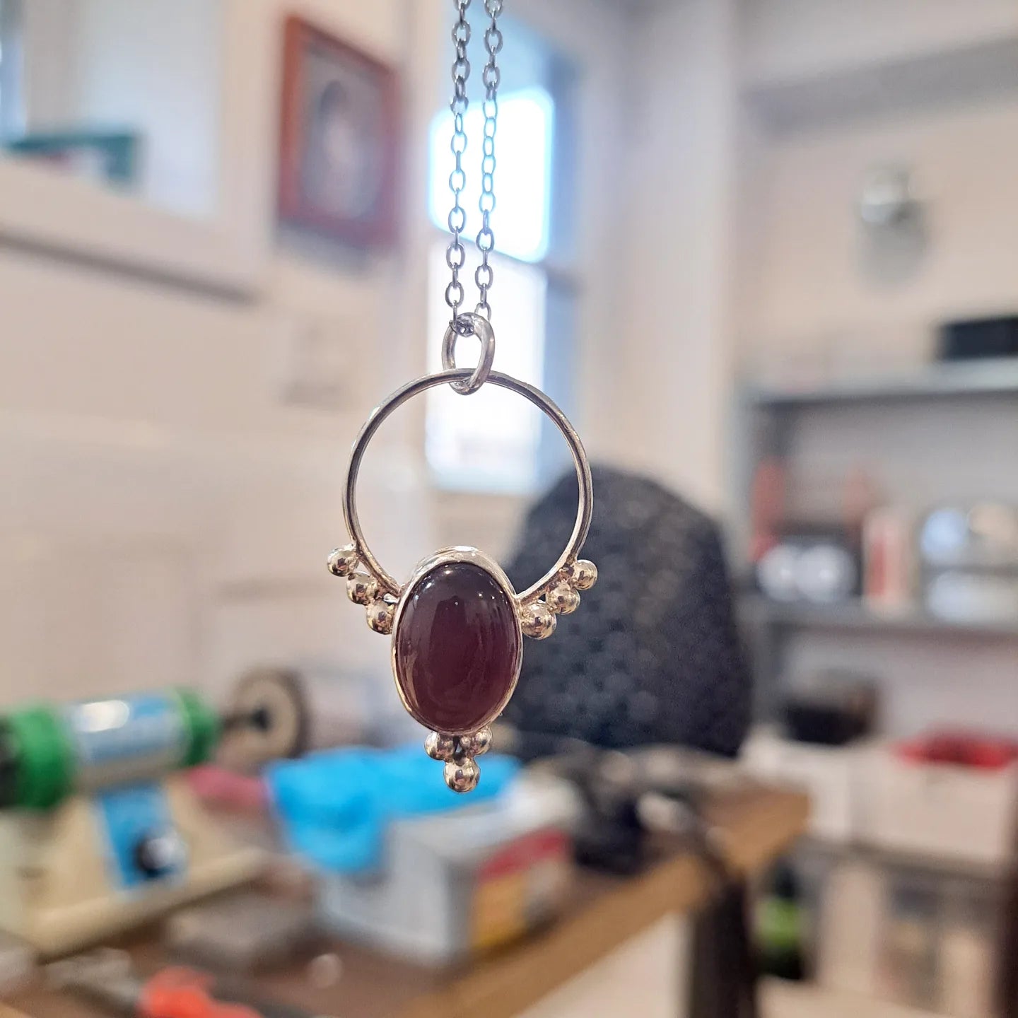 Red agate and silver pendant