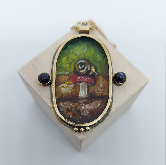 Snail and mushroom pendant